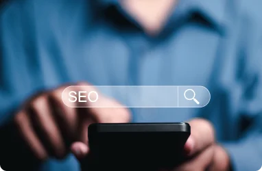 Man typing SEO into Google Search graphic