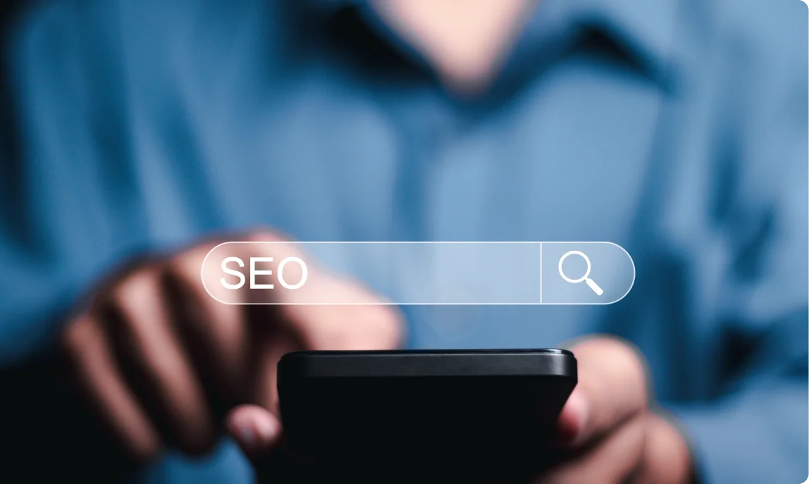 Man typing SEO into Google Search graphic