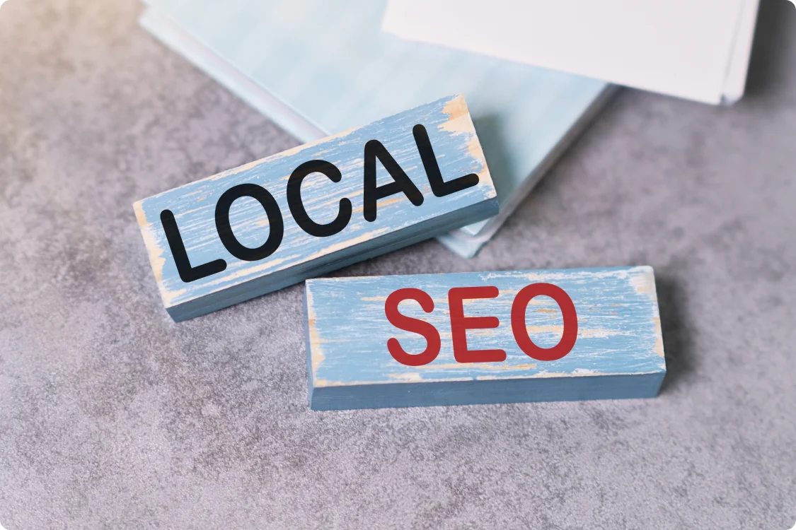 Local SEO text written out on wood blocks sitting on table