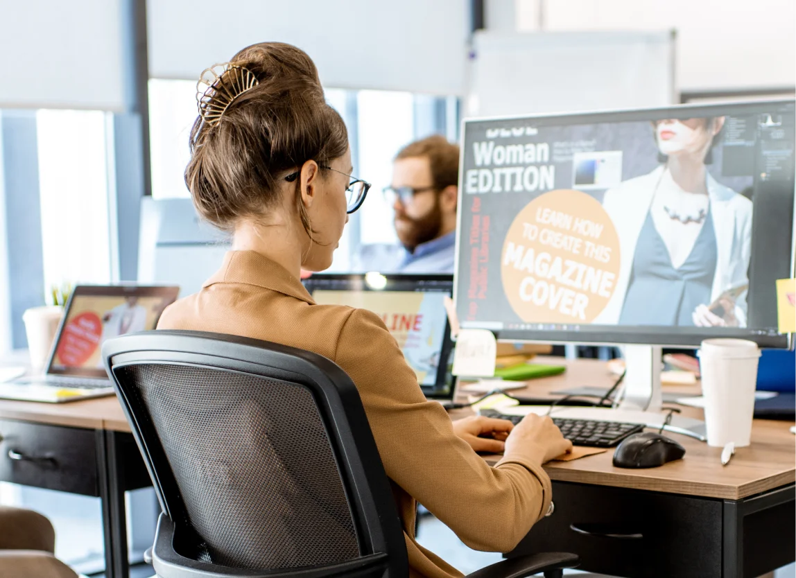 BEND web designer designing website on desktop computer